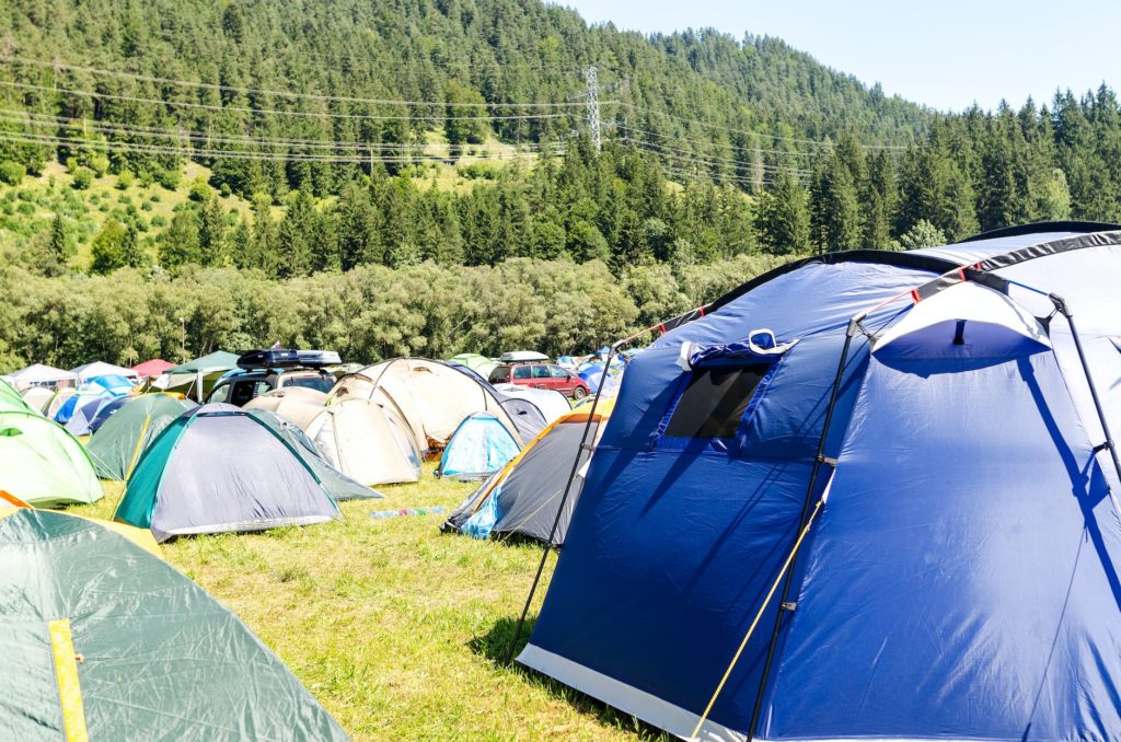 tents surrounded by trees