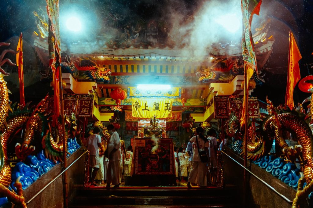 people in temple at night