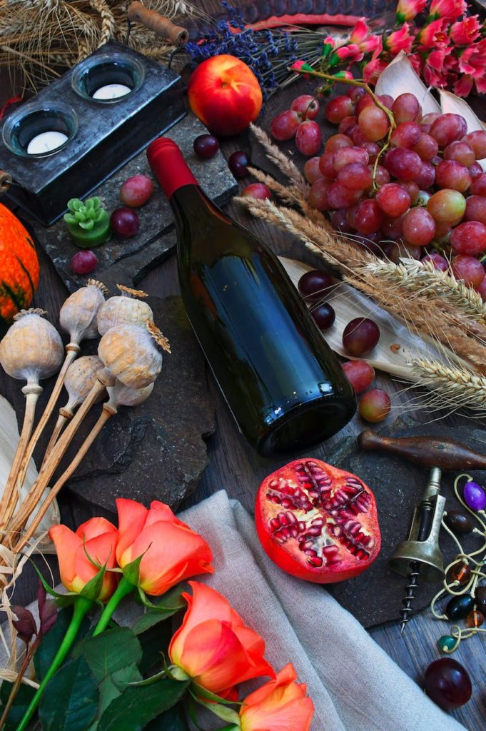 bottle beside grape fruit