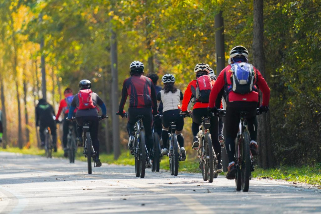 group of people riding a bicycle