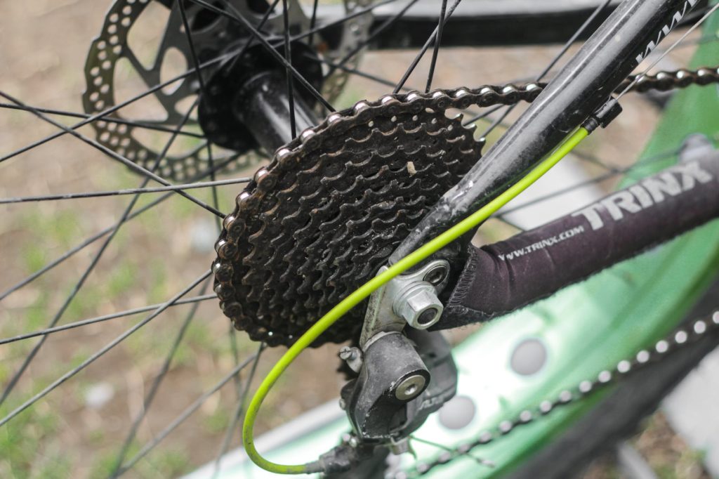 close up of chain on bicycle wheel