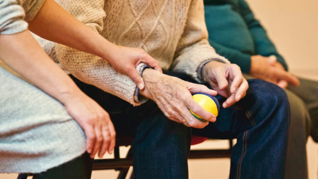 person holding a stress ball