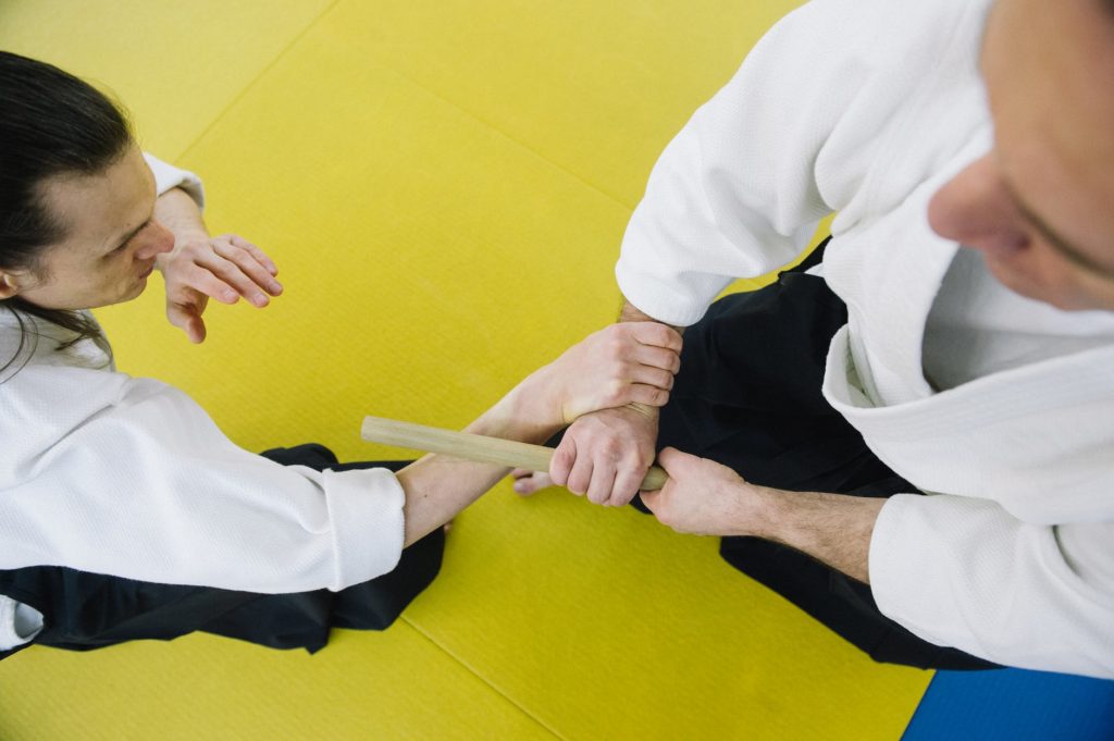 two men practicing aikido