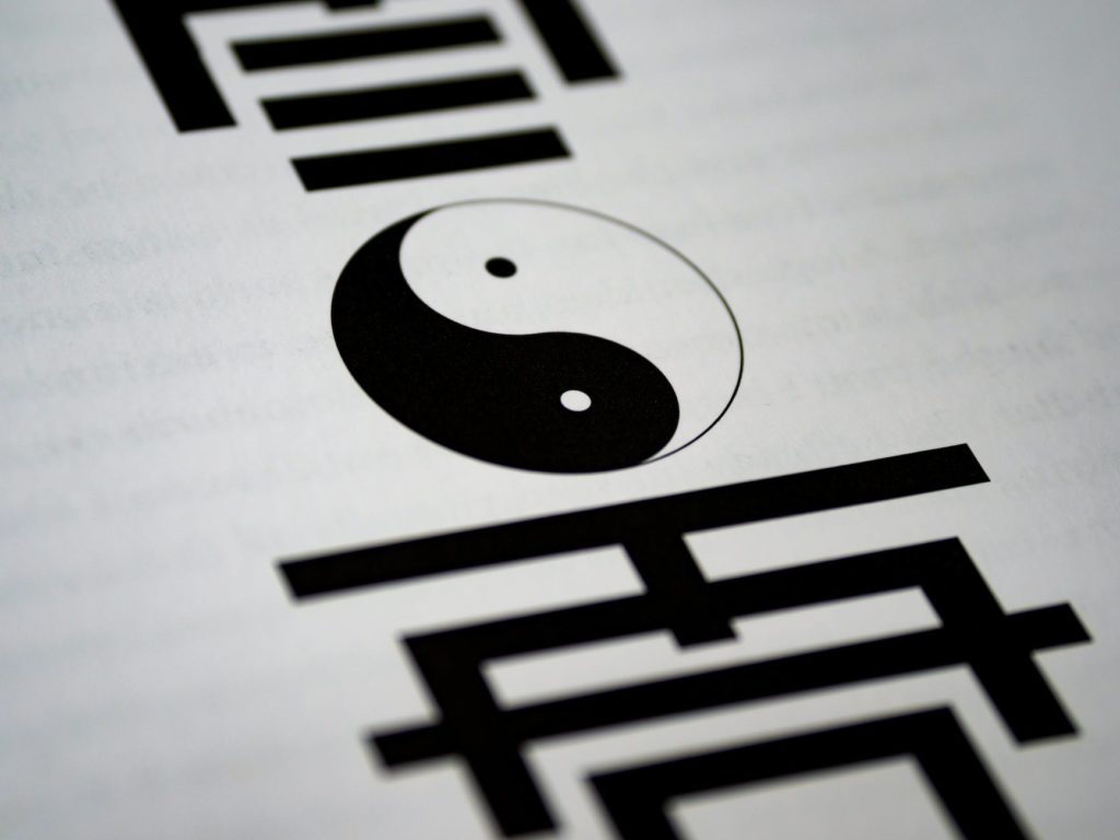 yin and yang printed on paper