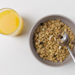 oats and nuts in gray bowl