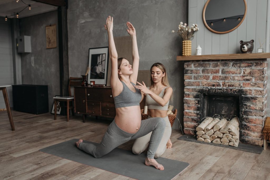 pregnant woman doing yoga