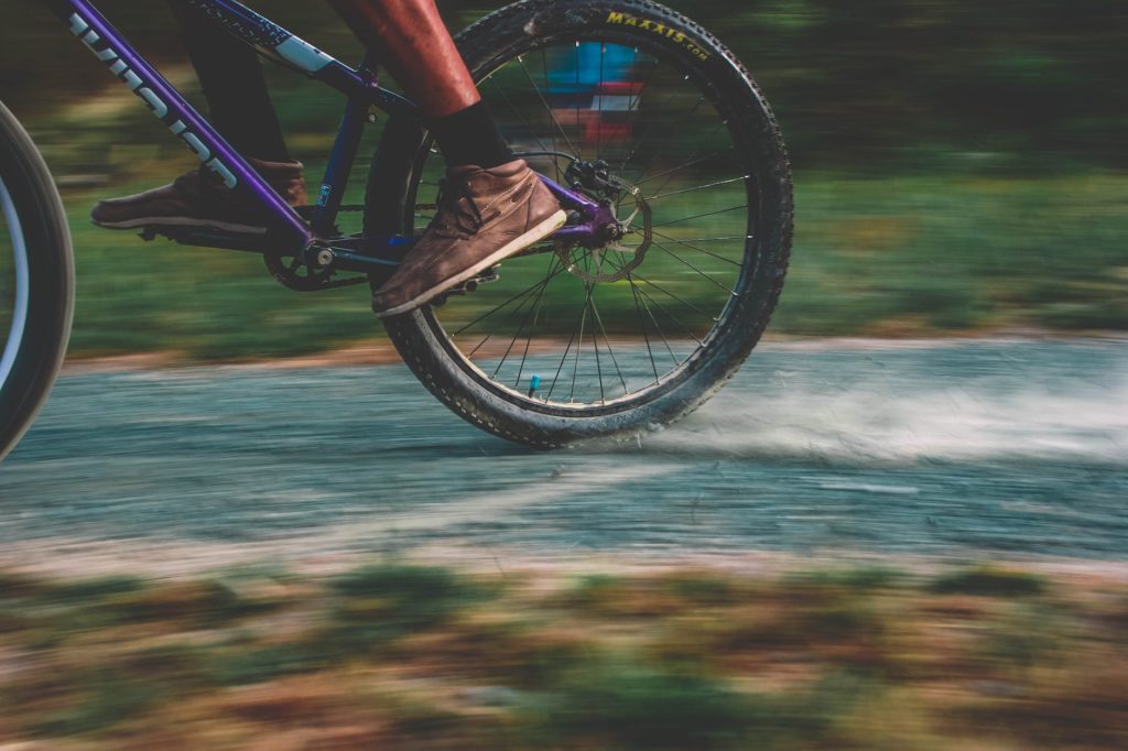 photo of purple mountain bike drifting