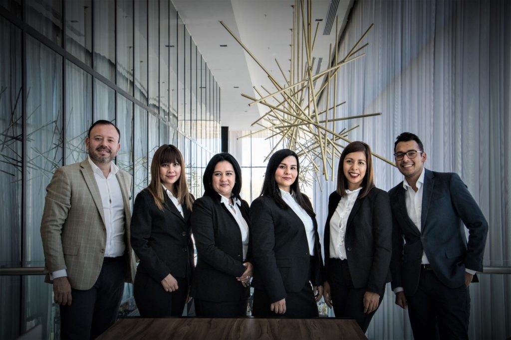 group of people in dress suits