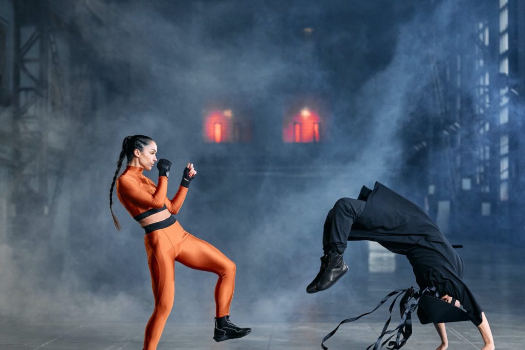 woman in orange long sleeve shirt and pants