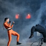 woman in orange long sleeve shirt and pants