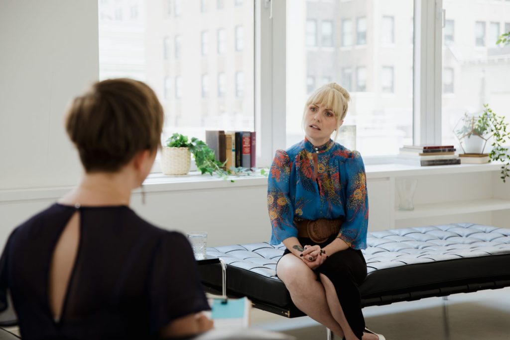 psychologist talking to a patient